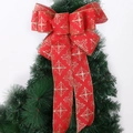 Large red Christmas bow with gold snowflake patterns on a green tree top decoration - Red Printed Bow (Large)
