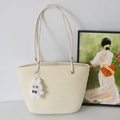 Off-white woven tote bag with brown leather straps and a cute plush bunny charm - Off-White And White Rabbit Charm