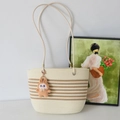 Beige woven tote bag with brown stripes and a cute plush bunny pendant accessory - Off-White And Khaki Striped And Brown Rabbit Charm