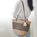 Large woven tote bag in natural and black stripes with a cute dog plush charm - Khaki And Black Striped And Red Nose Dog Charm