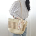 Large woven tote bag in cream with brown stripes and decorative lace floral bow - Off-White And Khaki Striped And Ribbon