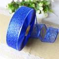 Macro detail of royal blue glitter mesh ribbon roll for festive Christmas DIY decoration - 2m Overlock Irregular Mesh Blue Ribbon