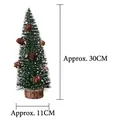 Detail view of 30cm frosted mini Christmas tree with pine cones and wooden base - 30cm Larch Christmas Tree