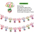 Vista dettagliata dello striscione per feste hawaiane con palloncini colorati e decori in carta - Confezione Regalo con Palloncini (Z11 Palloncino)