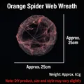 Detail van een 25cm Halloween krans van natuurlijke wijnstok met oranje spinnenweb - Oranje Spinnenzijde Rotan Ring