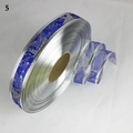Nastro natalizio blu reale con stelle glitterate argento e bordo metallico, da 2,5 cm - Motivi a Stelle Blu