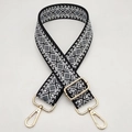 Detail of geometric diamond pattern shoulder strap with gold metal swivel hooks - Light Gold Hook / Black Base Grey Bow