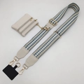 Detail view of checkered woven strap and cream leather pouch with gold hooks - Beige Light Blue Strap and Beige White Pouch