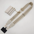 Detail of adjustable beige checkered strap with a three-zipper mini faux leather pouch - Beige Coffee Strap and Beige White Pouch