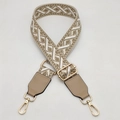 Detail view of adjustable wide woven shoulder strap with geometric diamond pattern - Camel With Camel Leather