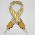 Detail of yellow geometric jacquard strap with yellow leather and gold metal hooks - Yellow + Yellow Leather