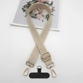 Detail of woven phone strap with golden metal clips and beige geometric patterns - Solid Beige With T-Pad