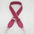 Detail of adjustable magenta nylon bag strap with gold metal hooks and leather reinforcement - Rose Red with Rose Red Leather