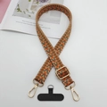 Détail de la bandoulière bohème tissée avec crochets dorés et attache téléphone - Motif Chevrons Orange Vert Brun (Style 5)