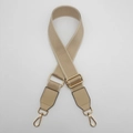 Close-up of adjustable beige canvas bag strap with light gold metal lobster clasps and buckles - Gunmetal Hook / Apricot with Apricot Leather