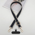 Dettaglio della tracolla per telefono in tessuto blu regolabile con fibbie in metallo oro - Bordo Beige Nero Con Pad a T