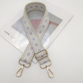 Detail of adjustable wide woven shoulder strap with light purple and beige rhombus pattern - Light Gold Hook / Beige White Purple