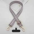 Macro view of adjustable lilac woven phone lanyard with golden metal hardware and strap card - T-Shaped Gasket / Light Purple