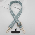 Ethnic jacquard phone strap with green geometric pattern, gold buckles and black patch - Light Blue One With T-Pad