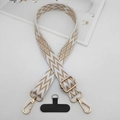 Macro shot of adjustable geometric pattern phone strap with golden metal hardware and patch - White and Gold Wave Rhombus (Style 10)