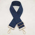 Close-up of navy blue canvas strap with diamond weave and gold metal lobster clasps - Navy Blue