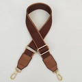 Macro shot of adjustable brown canvas shoulder strap with gold metal buckle and leather ends - Coffee with Brown Edge and Brown Leather
