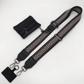 Close-up of adjustable woven shoulder strap with mini pouch and phone tether tab - Dark Gray Gunmetal Hook and Black Pouch