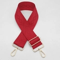 Detail view of red jacquard pattern shoulder strap with premium gold metal lobster clasps - Red