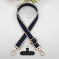 Detail of adjustable jacquard phone strap with navy geometric pattern and gold alloy hooks - Beige Edge Blue With T-Pad
