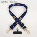 Detail of adjustable blue leopard print phone lanyard with gold clips and black patch - Light Blue (Gold Hook + Gasket)