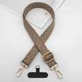 Detail of adjustable woven phone strap with brown wave pattern and gold metal hardware - Brown & Beige Wave Style (Style 11)