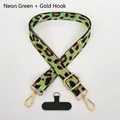 Detail of neon green leopard jacquard phone strap with gold hardware and connector - Neon Green (Gold Hook + Gasket)
