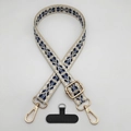 Detail of adjustable crossbody phone strap with beige and navy geometric lattice pattern - Beige White Lake Blue