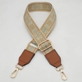 Detail of adjustable floral strap with gold lobster clasp and brown leather ends - Brown Edge Green + Brown Leather
