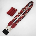 Detail of red camouflage fabric crossbody strap with small pouch and gold metal hardware - Red Pattern + Wine Red Bag