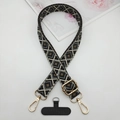 Detail of bohemian geometric rhombic woven phone strap with gold adjustable buckle - Black White Gray Coffee Rhombus (Style 13)