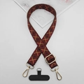 Detail of adjustable ethnic geometric pattern phone strap with gold metal buckle and connector - Red Brown Geometric Rhombus (Style 16)