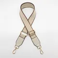 Detail of adjustable beige woven bag strap with brown edges and golden metal hardware - Silver Hook / Rice White