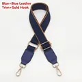 Detail of adjustable blue crossbody strap with gold metal hooks and tan leather accents - Silver Hook / Blue with Brown Edge