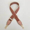 Detail of adjustable woven replacement shoulder strap with pink leather and gold lobster clips - Pink with Pink Trim