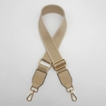 Detail of adjustable khaki woven shoulder strap with high-quality gold hardware buckles - Apricot