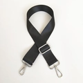 Close-up of adjustable black nylon bag strap with silver metal buckles and lobster clasps - Black with Silver Hardware