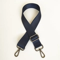 Detail of navy blue nylon bag strap showing herringbone weave and metal lobster clasps - Blue with Gunmetal Hardware