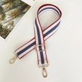 Detail of adjustable canvas bag strap with red, white, and blue stripes and gold hooks - Length approx. 130cm / Red Blue + Gold Hook