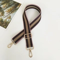 Detail of adjustable woven handbag strap with colorful stripes and gold metal lobster clasps - Length approx. 130cm / Pink Coffee + Gold Hook