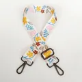 Detail of adjustable floral woven bag strap with gunmetal swivel lobster clasps - White & Yellow Floral / Gunmetal