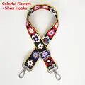 Close-up of adjustable floral patterned woven shoulder strap with silver metal swivel hooks - Colorful Flowers / Silver