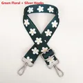 Detail of adjustable green floral guitar strap with silver hooks and daisy patterns - Green Flower / Silver