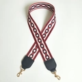 Detail of red and black chain-pattern woven strap with golden metal swivel lobster clasps - Total length about 100cm / Burgundy and Black Leather and Light Gold Hook