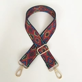 Close-up of ethnic geometric woven bag strap with golden rotating metal lobster clasps - Multicolor Geometric With Gold Hook